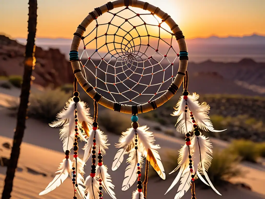 Un atrapasueños nativo con plumas y cuentas, destacado contra un atardecer en el desierto